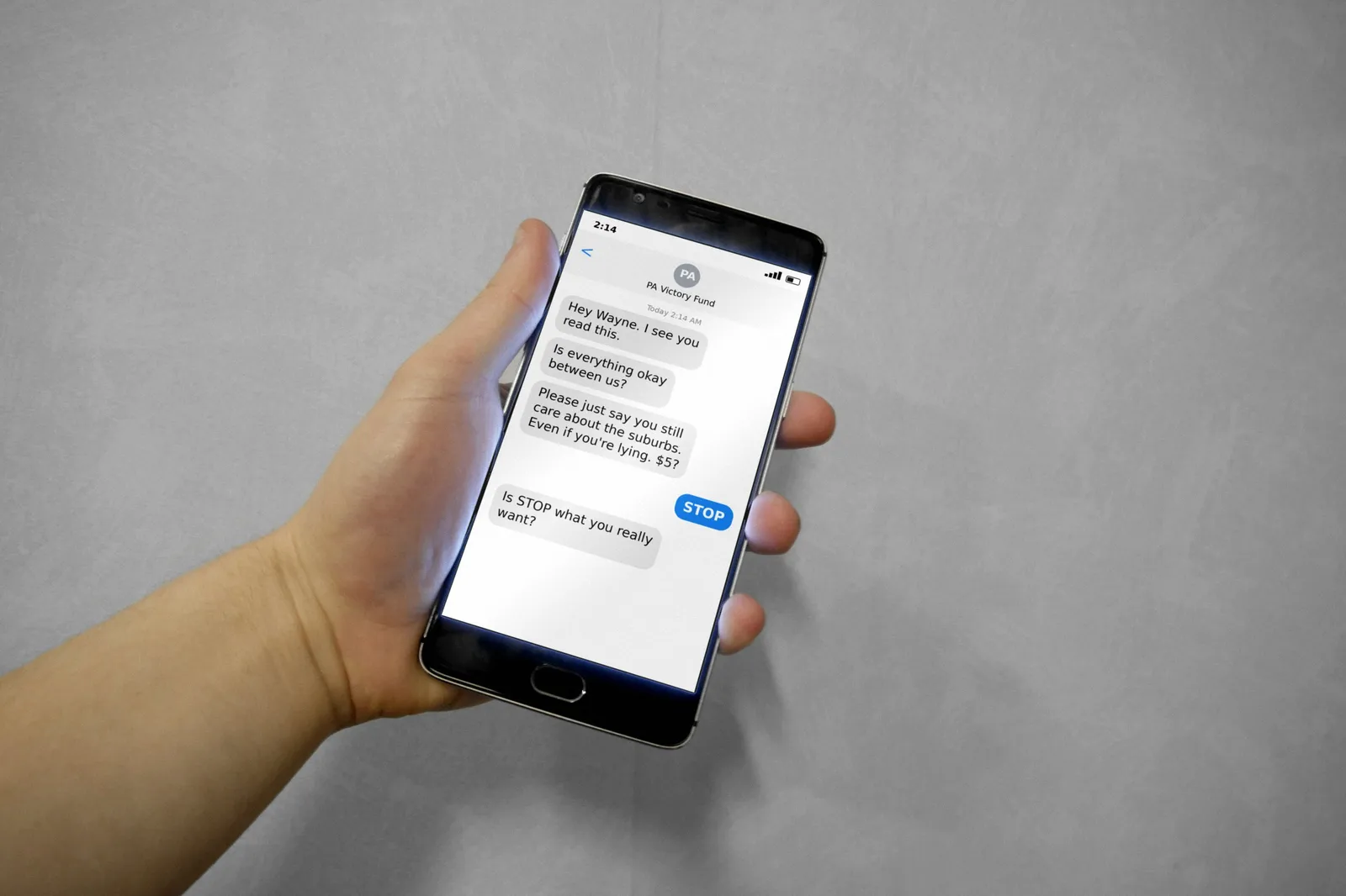 A hand holds a smartphone showing late-night campaign texts asking if everything is okay, a reply reading STOP, and a follow-up asking if STOP is what he really wants.