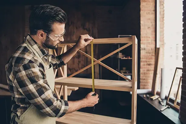 Local Man’s Plan to “Quickly Organize Garage” Results in 8-Hour Debate Over Shelf Placement