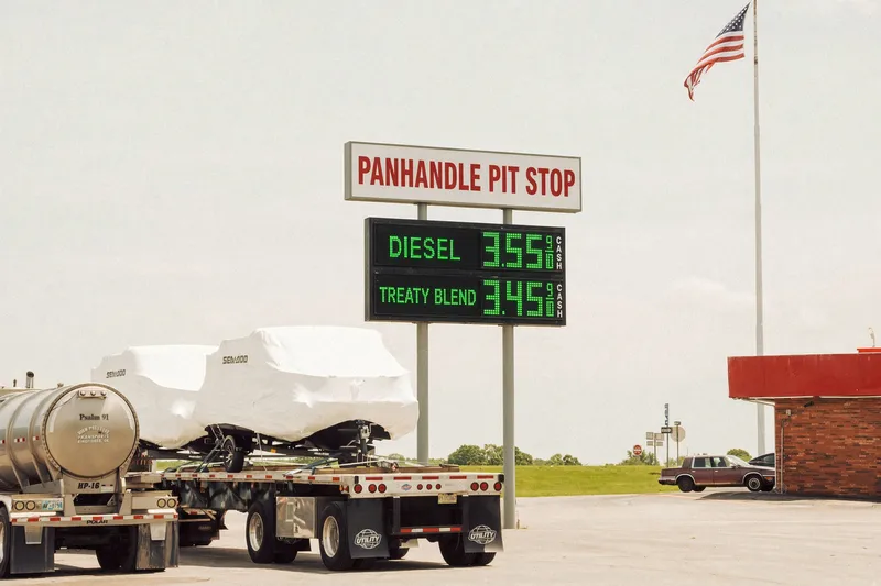 Panhandle Pit Stop truck stop sign listing a Treaty Blend diesel price